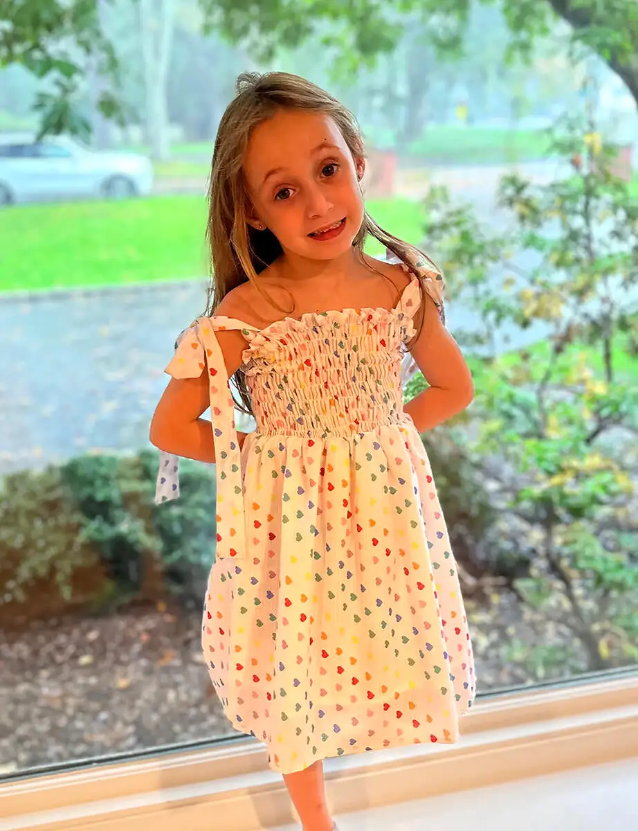 Tweenstyle by Stoopher Rainbow Heart Print Smocked Tie Strap Dress